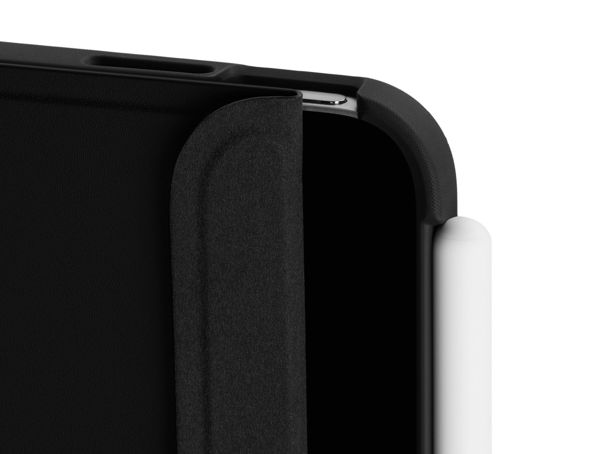 A close-up of the top corner of our iPad Folio Grip with the Folio slightly unfurled, detailing the inner suede lining. 