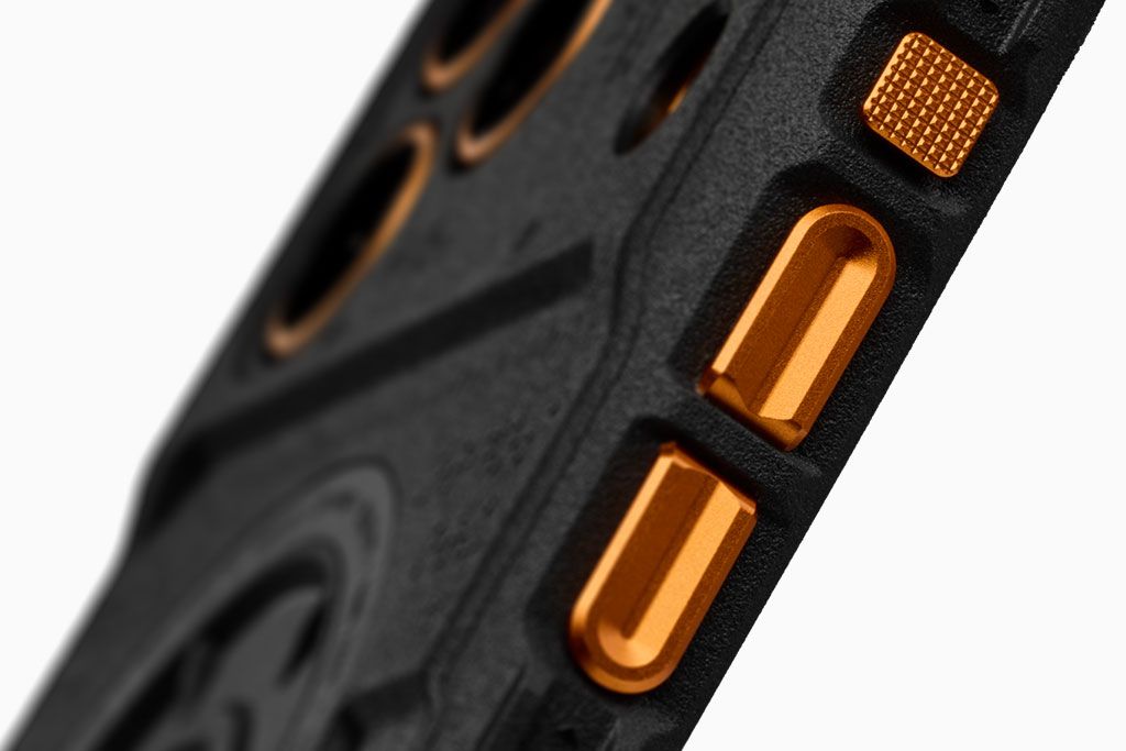 A dbrand Tank Case with custom orange buttons