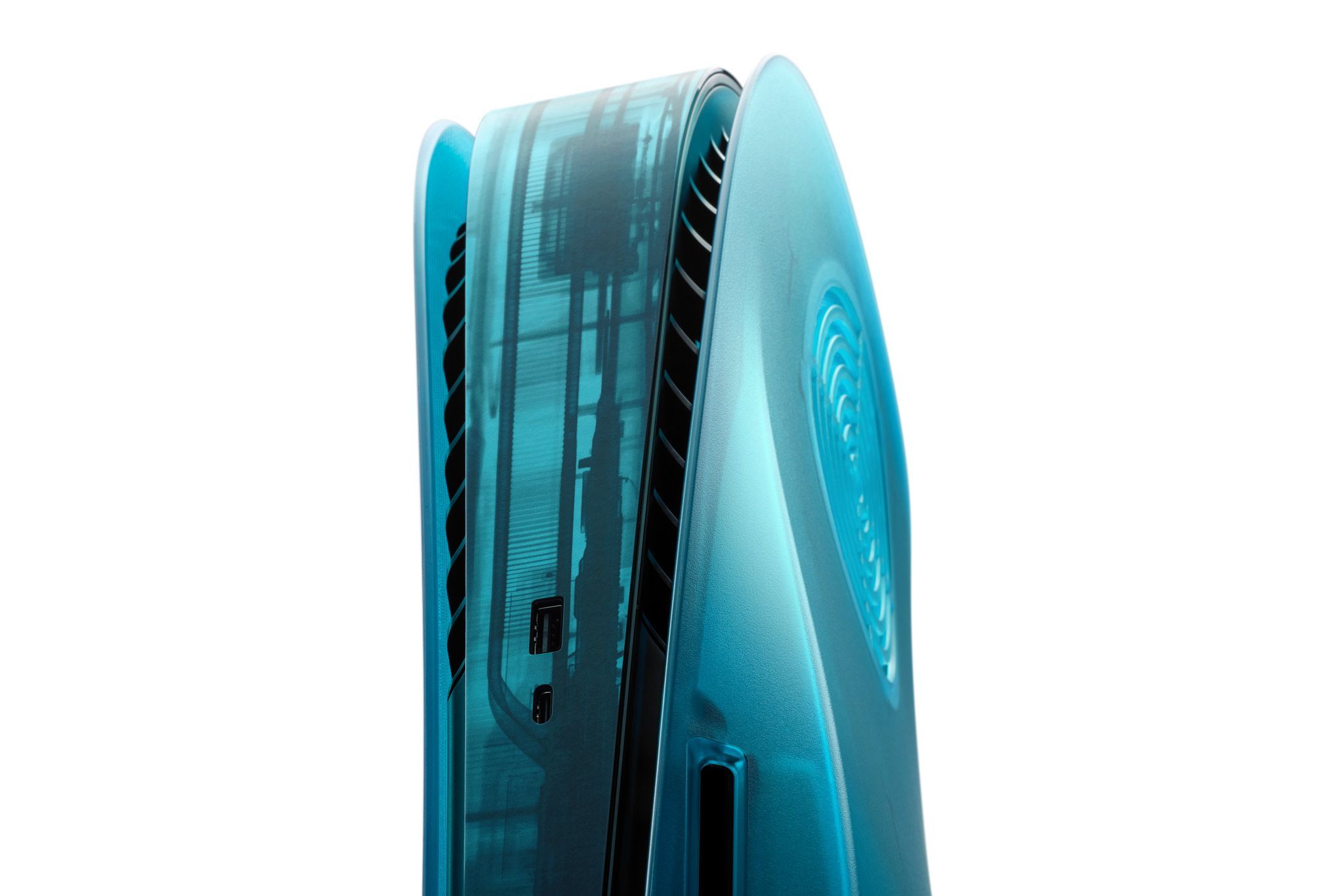 The front half of a PlayStation 5, seen from an angle looking upwards. The console has our Ice Blue Darkplates applied, along with an Ice Blue Middle Skin. 