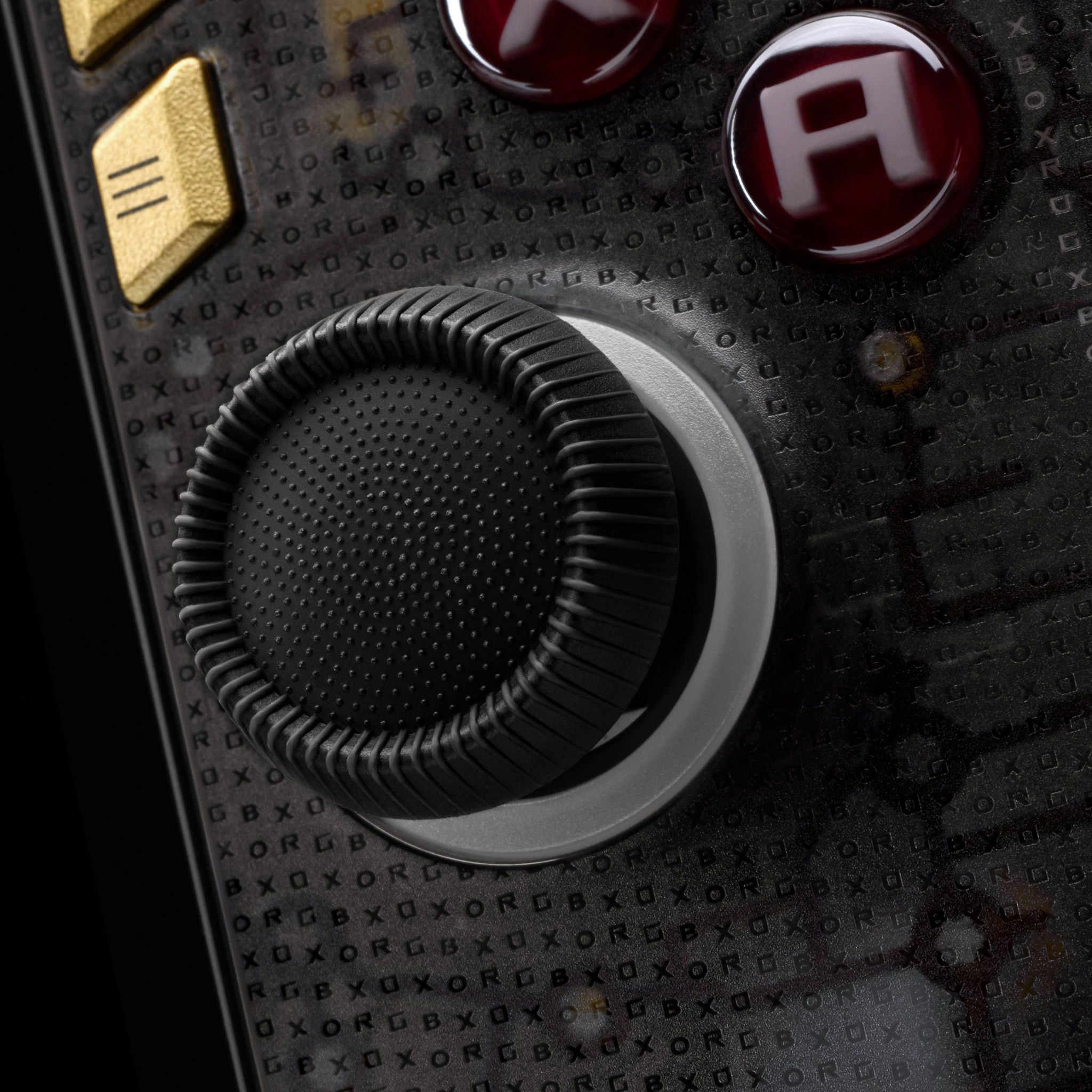 A close-up of our Stick Grips for the ROG Xbox Ally X20, showing the textured ergonomic convex shape, the microdots in the middle of the stick, and the ridges on the edge. 