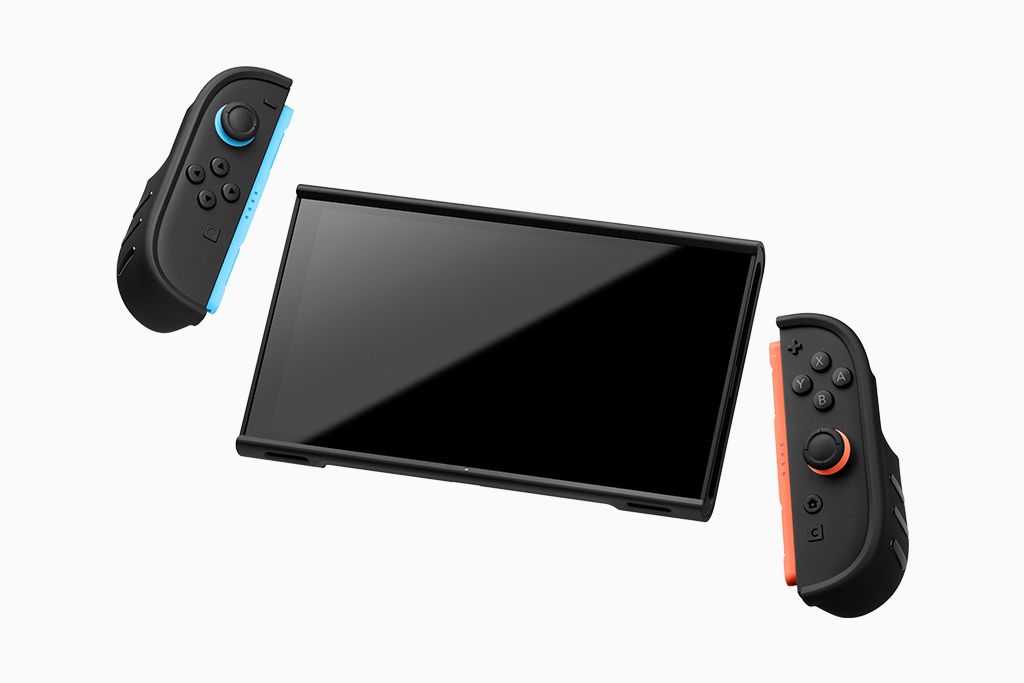 A Switch 2 with both Joy-Cons detached, each hovering on either side of the main console. All three have components of a dbrand Killswitch case attached.