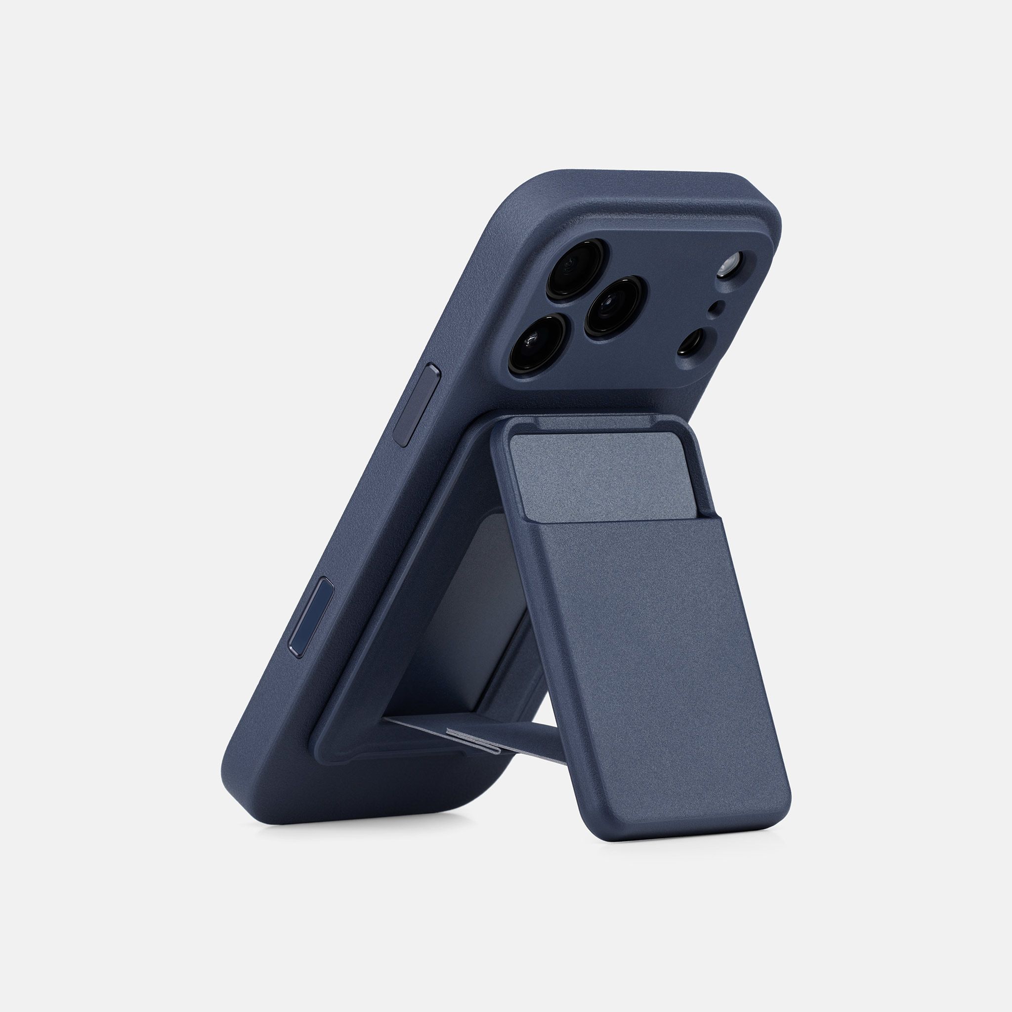 A kickstand wallet in the Navy colorway attached to a matching Navy phone case for iPhone 18 Pro Max