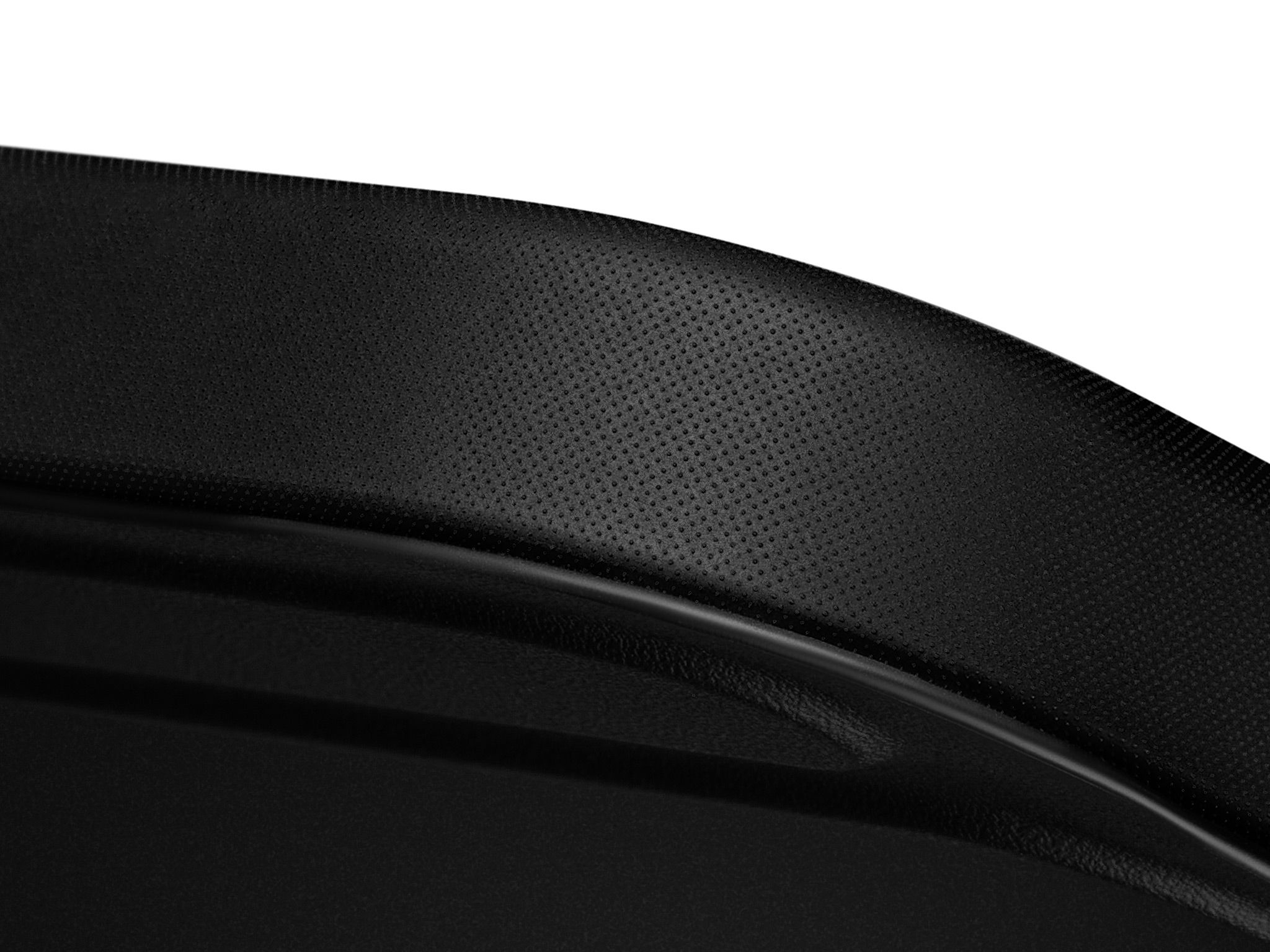 A close-up of one of the corners on an iPad Folio Grip, detailing the unique dotted texture lining the surface of the case.